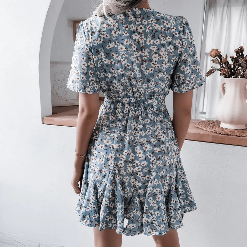 FLEUR™ | PLEATED V-NECK WITH RUCHED WAIST FLORAL MINI DRESS