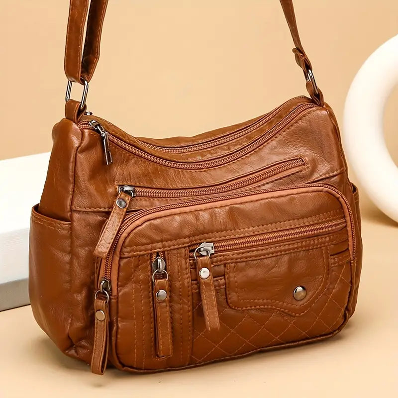 DAISHA™ MULTI-POCKET SOFT VEGAN LEATHER CROSSBODY BAG